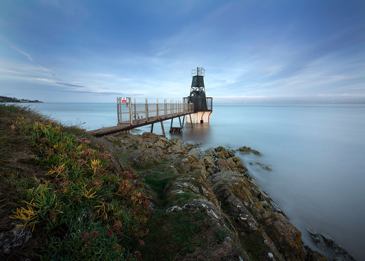 Photographed in the early morning view, this view of the Portishead Battery Point lighthouse in the Severn estuary captures an unusually calm and tranquil day.