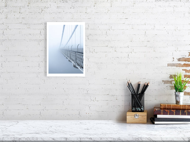 Print of Clifton suspension bridge in mist shown against a brick wall
