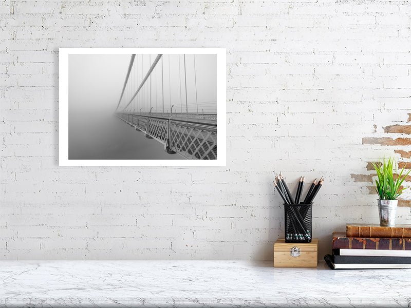 Print of Clifton suspension bridge in mist shown against a brick wall