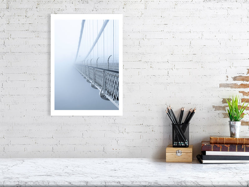 Print of Clifton suspension bridge in mist shown against a brick wall