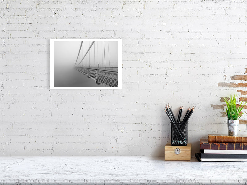 Print of Clifton suspension bridge in mist shown against a brick wall