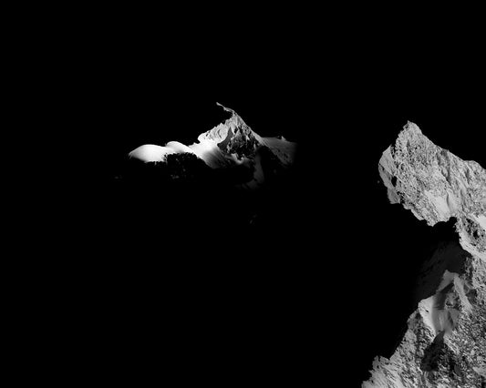 The summit of Mont Blanc standing head and shoulders above the rest of the massif with the Aiguille de Bionnassay in the foreground