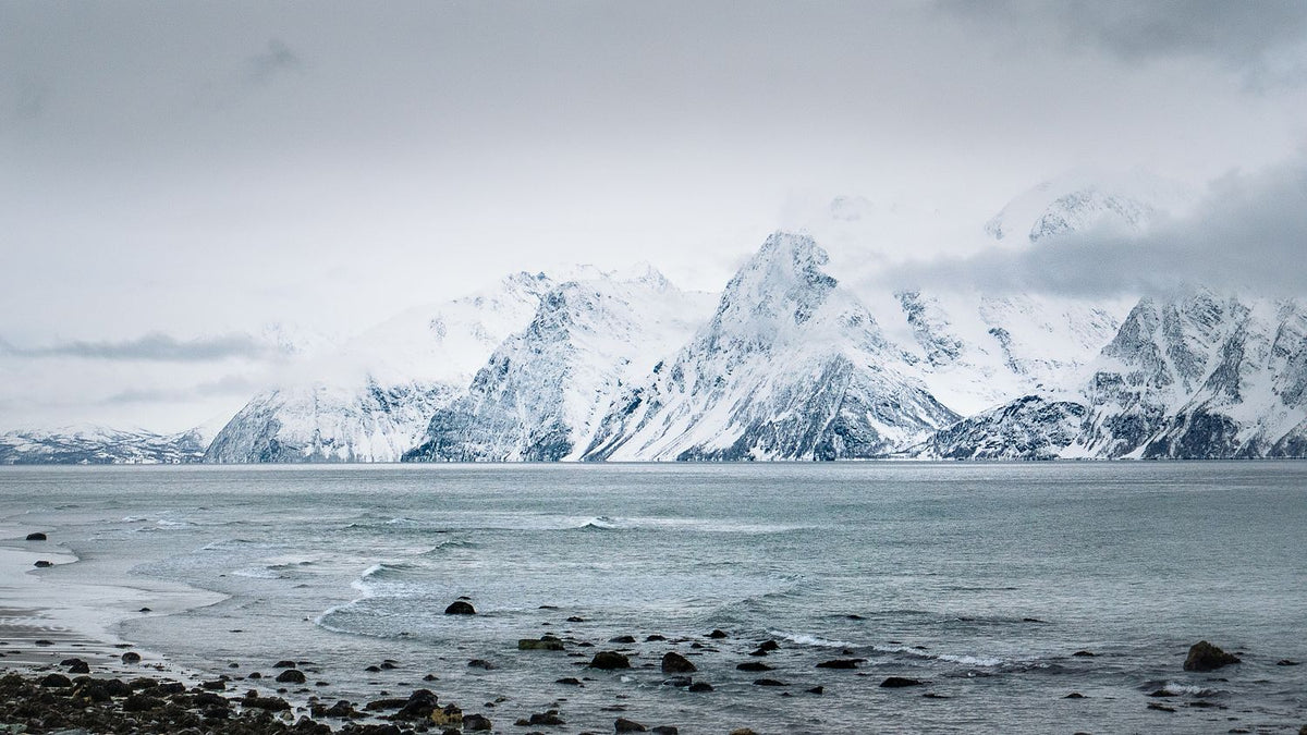 Norwegian fjord leading towards snow-covered mountains, Across the Fjord fine-art photograph
