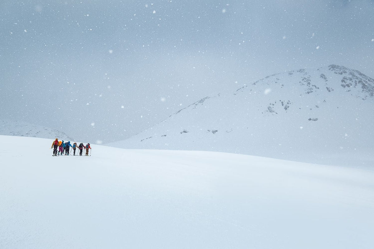 Ski Tourers battle the fall of winter: Snow Flurries on high