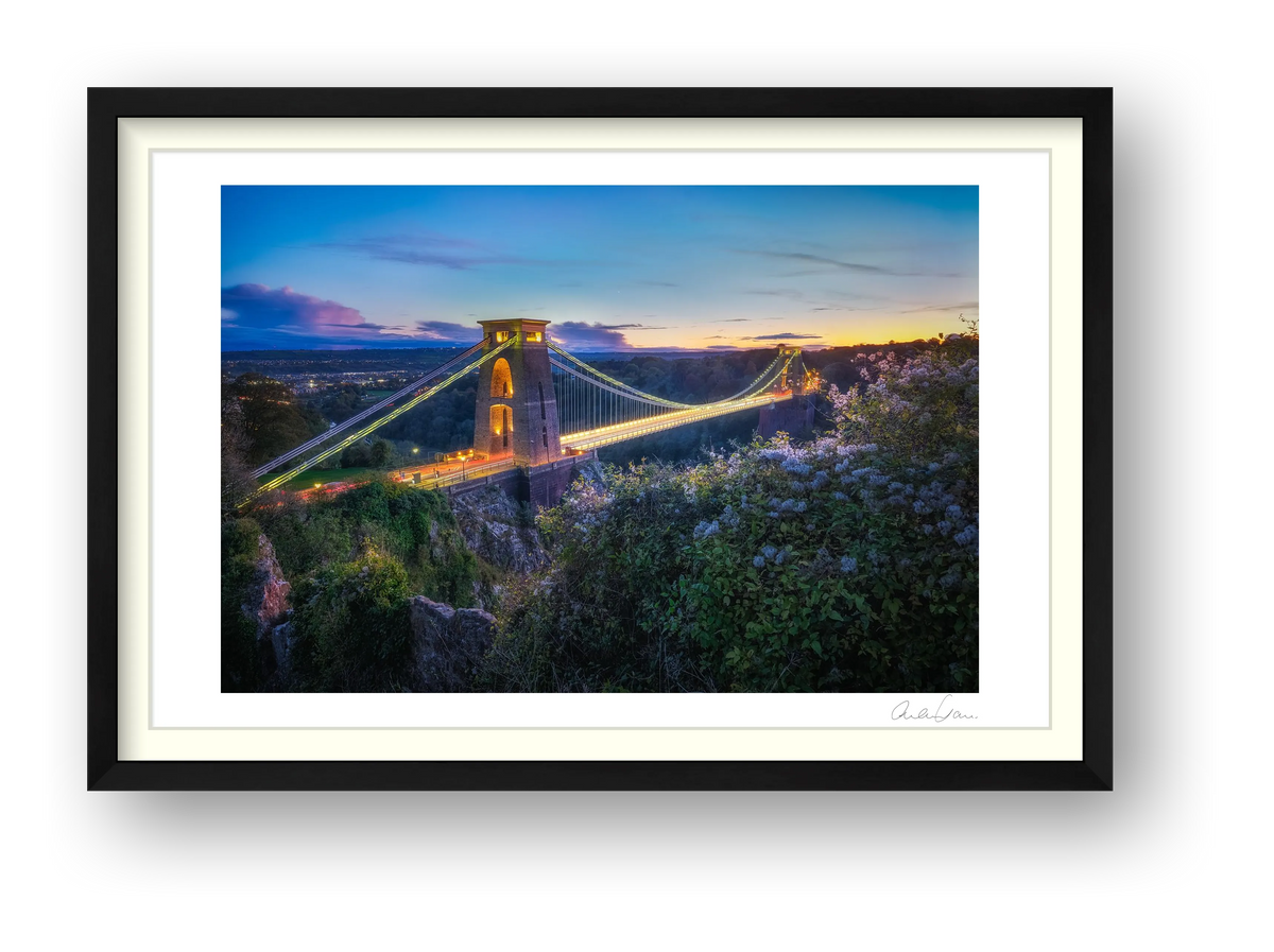 Lights on and the sunset glow, Clifton Suspension Bridge, Bristol — framed